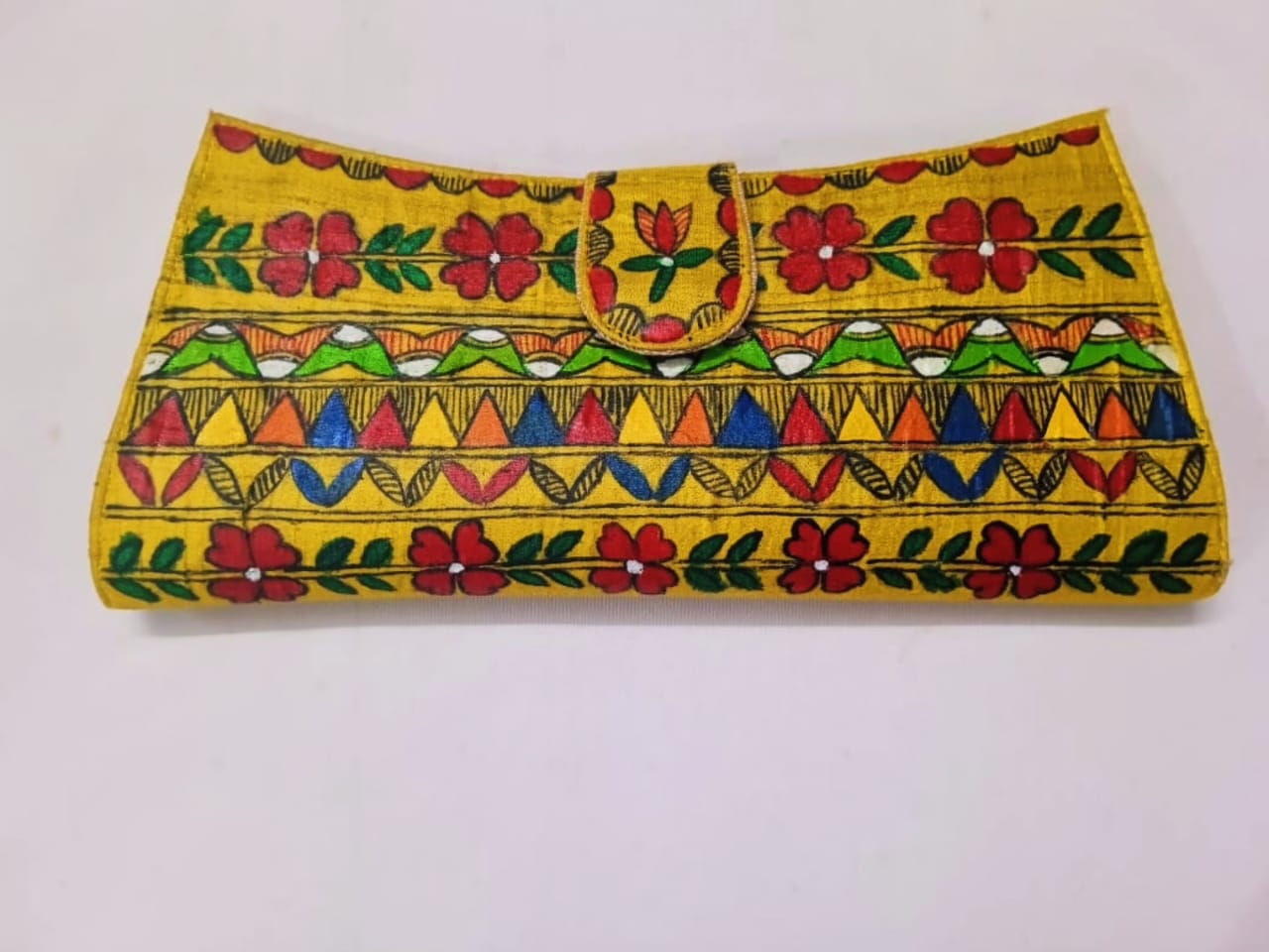 Golden color flap clutch 